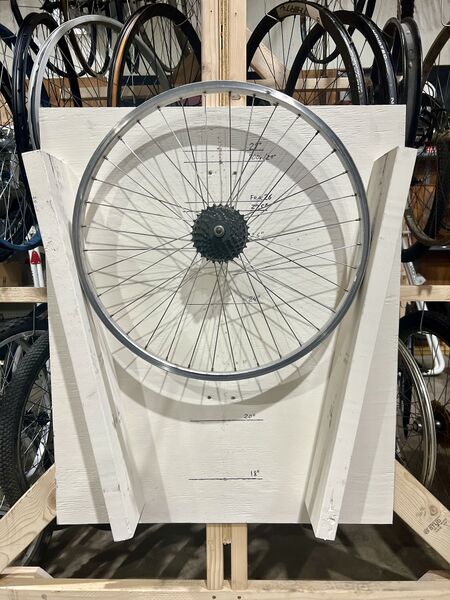 File:Wheel sizer with wheel.jpg